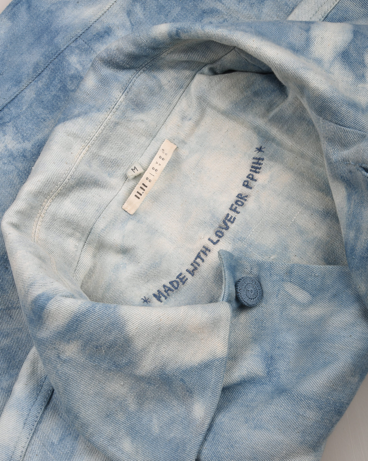 11.11 UNISEX GLEAM COTTON TRUCKER JACKET - LIGHT INDIGO