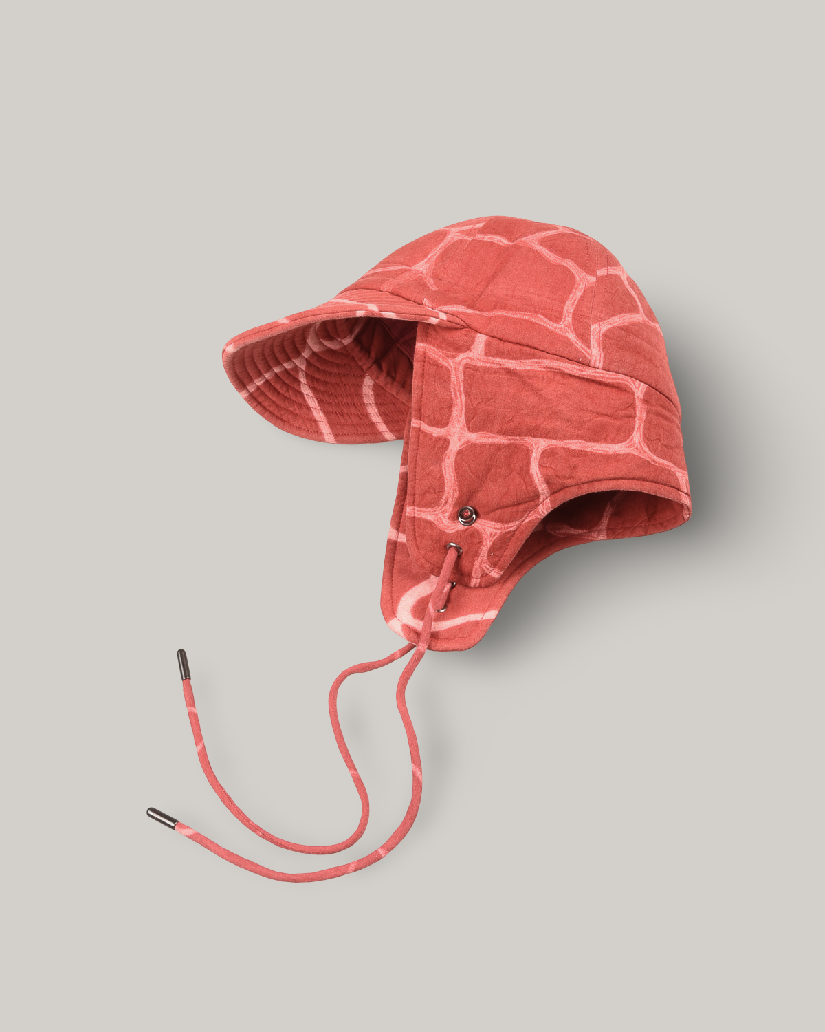 KARDO QUILTED SHIBORI FLAP CAP - LIVING CORAL