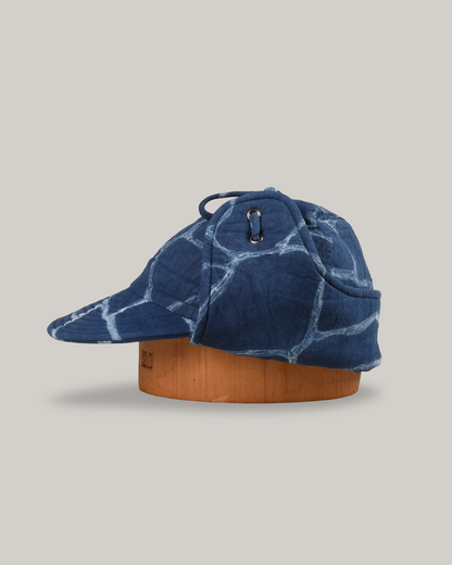 KARDO QUILTED SHIBORI FLAP CAP - INDIGO