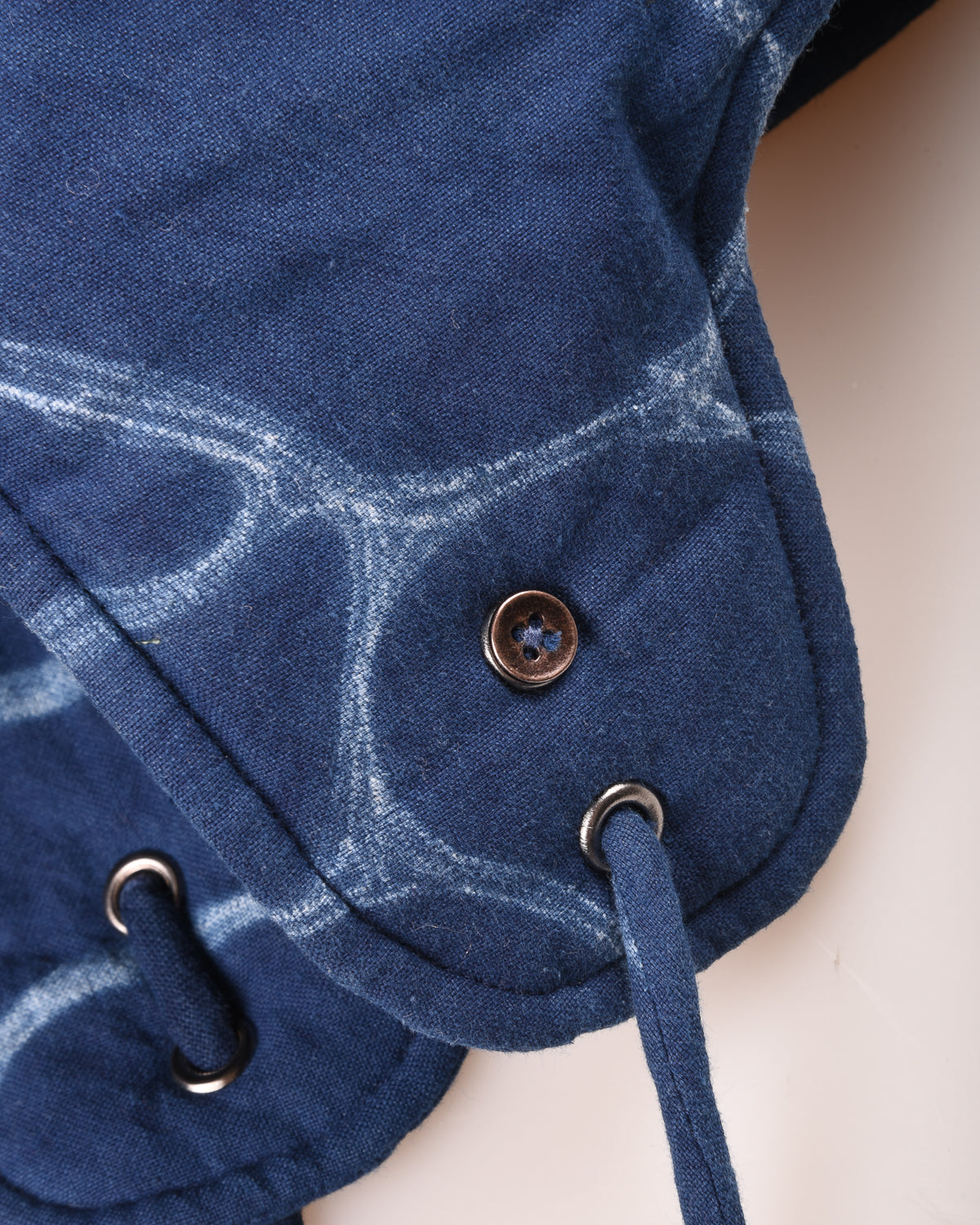 KARDO QUILTED SHIBORI FLAP CAP - INDIGO