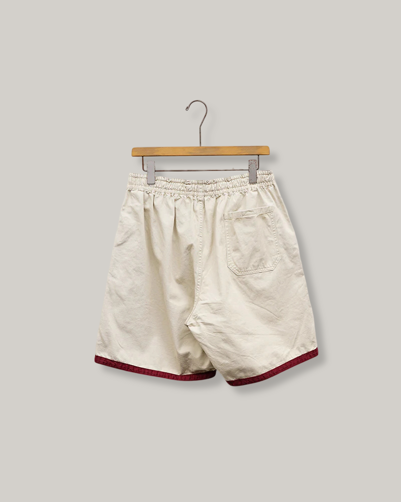 NIGEL CABOURN MAINLINE RUGGER SHORT - PIGMENT FADE - IVORY
