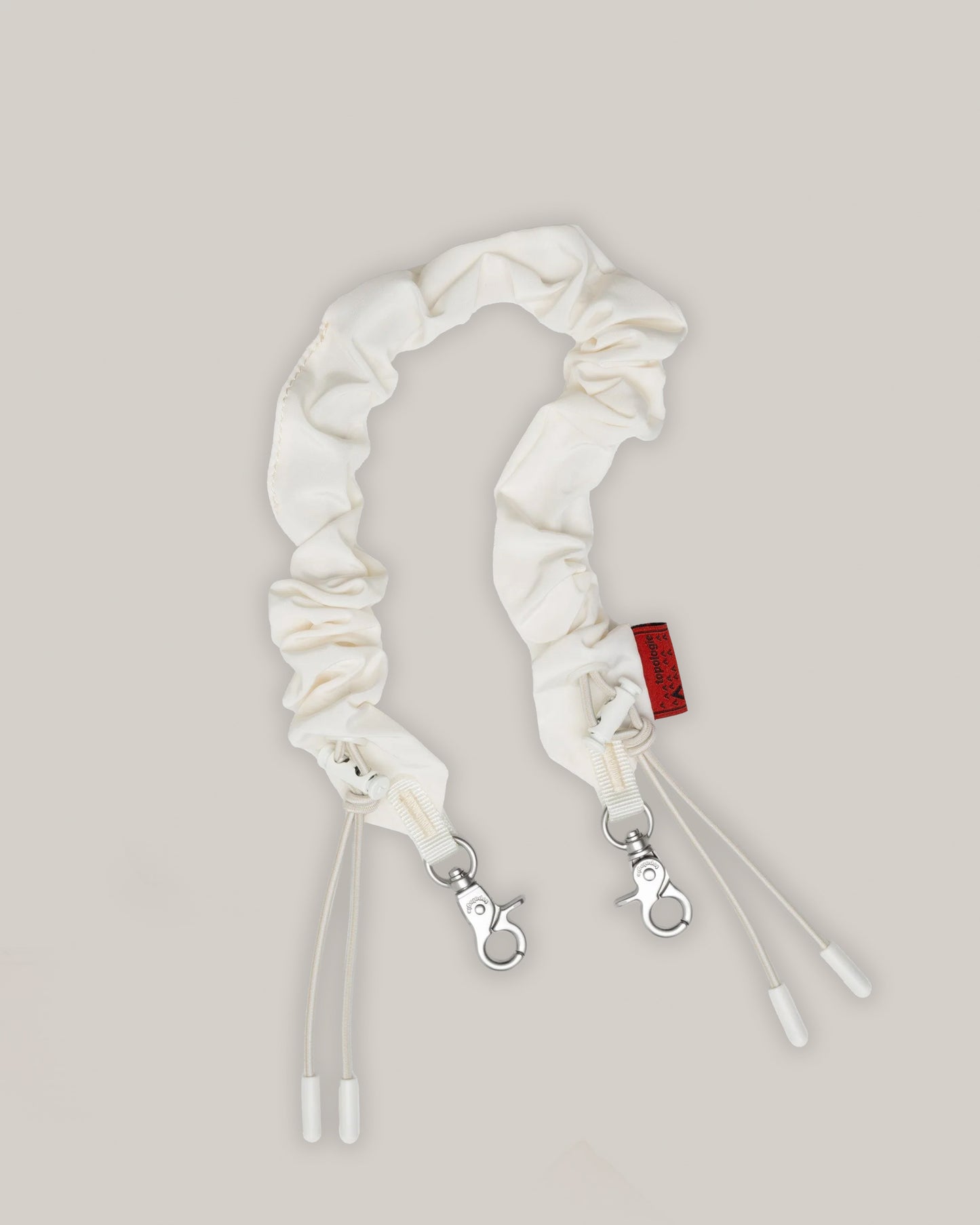 TOPOLOGIE BUNGEE WRIST STRAP OFF WHITE TECH SATEEN
