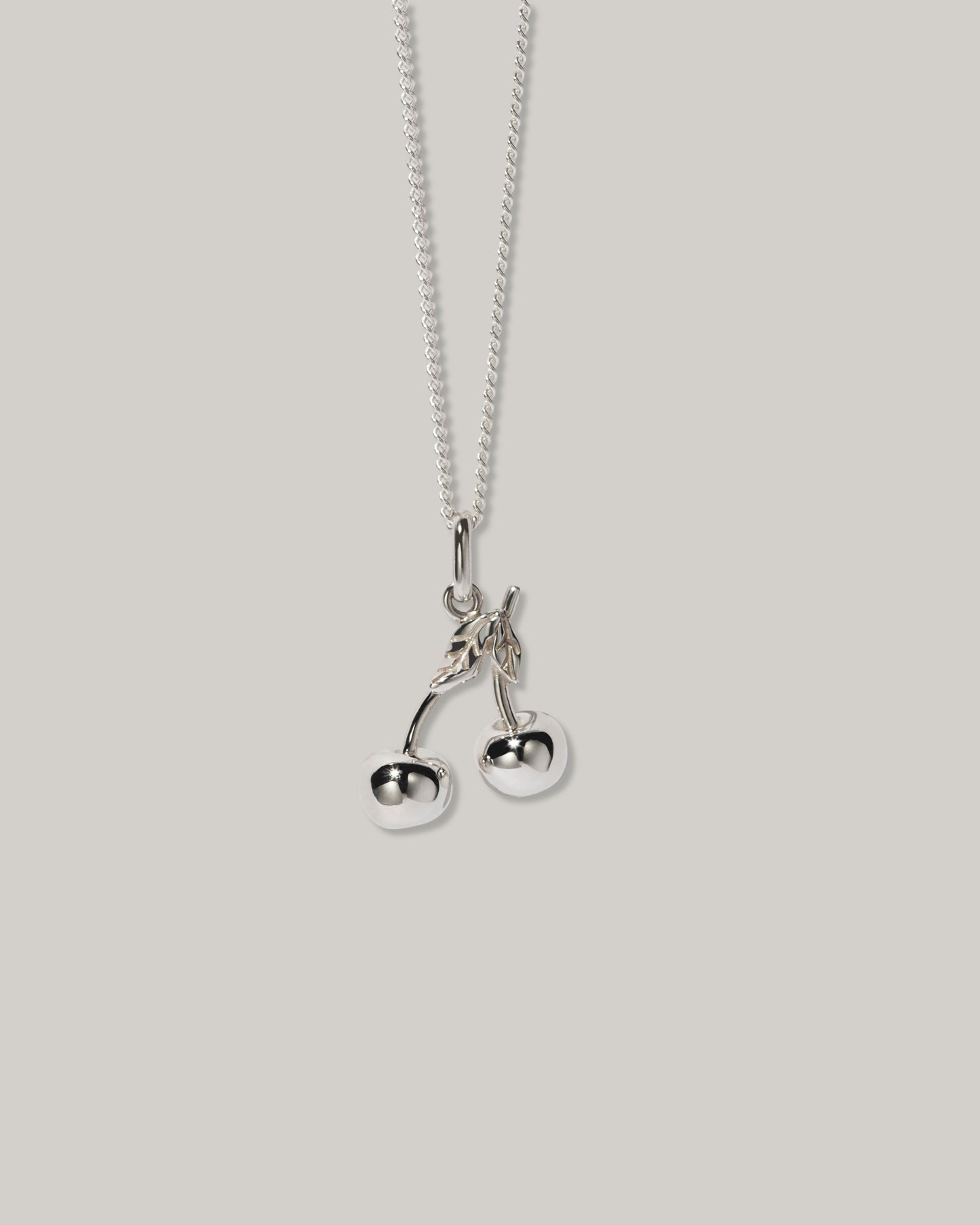 MEADOWLARK CHERRY CHARM NECKLACE - STERLING SILVER