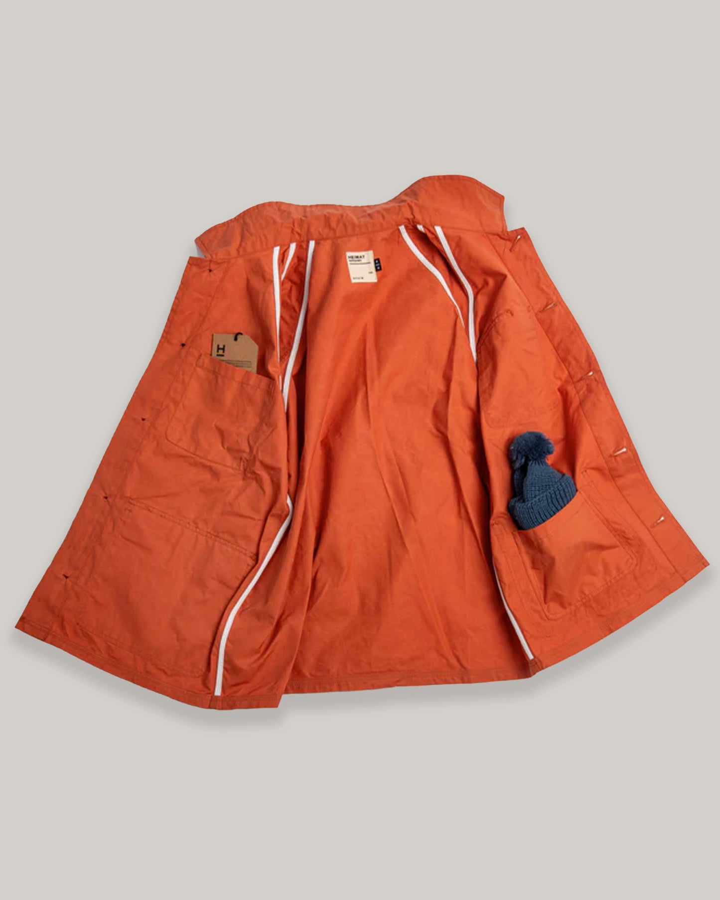 HEIMAT JOURNEY WAX COAT - RESCUE ORANGE
